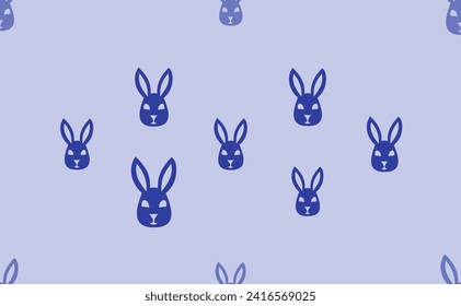 Seamless pattern of large isolated blue cute hare head symbols. The pattern is divided by a line of elements of lighter tones. Vector illustration on light blue background