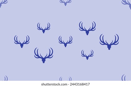Seamless pattern of large isolated blue deer horns symbols. The pattern is divided by a line of elements of lighter tones. Vector illustration on light blue background