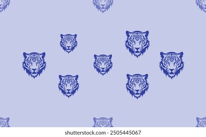 Seamless pattern of large isolated blue tiger head symbols. The pattern is divided by a line of elements of lighter tones. Vector illustration on light blue background