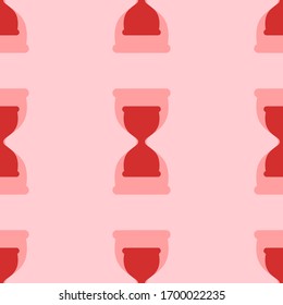 Seamless pattern of large isolated red hourglass symbols. The elements are evenly spaced. Vector illustration on light red background