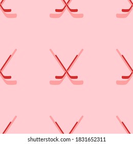 Seamless pattern of large isolated red hockey symbols. The elements are evenly spaced. Vector illustration on light red background