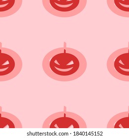 Seamless pattern of large isolated red halloween pumpkin symbols. The elements are evenly spaced. Vector illustration on light red background