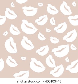Seamless pattern of large silhouettes of kissing lips white on beige background