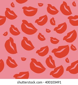 Seamless pattern of large silhouettes of kissing lips red on pink background