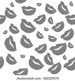 Seamless pattern of large silhouettes of kissing lips grey on light background