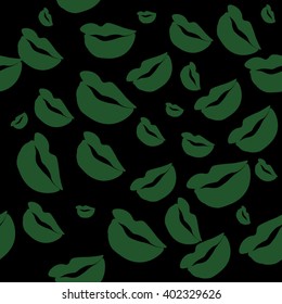 Seamless pattern of large silhouettes of kissing lips green on dark background