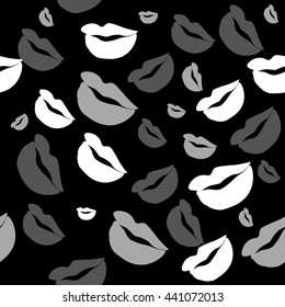 Seamless pattern of large silhouettes of kissing lips colorful background