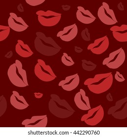 Seamless pattern of large silhouettes of kissing lips colorful background