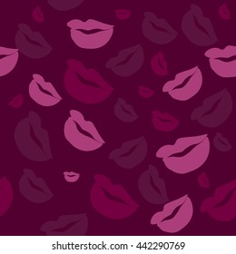 Seamless pattern of large silhouettes of kissing lips colorful background