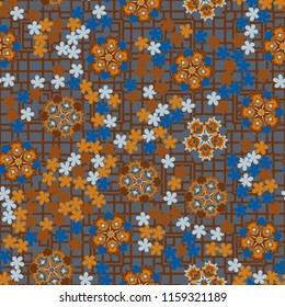 Seamless pattern of large and small abstract flowers. Against the background of a network consisting of quadrangles and crosses.
