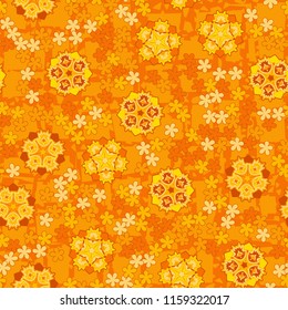 Seamless pattern of large and small abstract flowers. Against the background of an old network consisting of lines intersecting at right angles.
