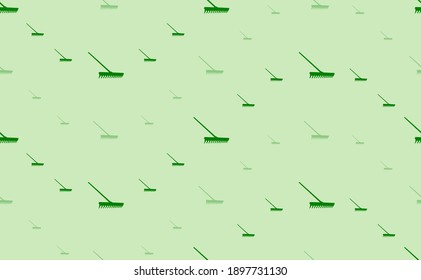 Seamless pattern of large and small green rake symbols. The elements are arranged in a wavy. Vector illustration on light green background