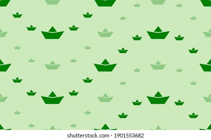 Seamless pattern of large and small green paper boat symbols. The elements are arranged in a wavy. Vector illustration on light green background