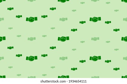 Seamless pattern of large and small green handshake symbols. The elements are arranged in a wavy. Vector illustration on light green background