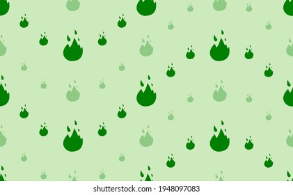 Seamless pattern of large and small green fire symbols. The elements are arranged in a wavy. Vector illustration on light green background