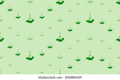 Seamless pattern of large and small green rowan berrys. The elements are arranged in a wavy. Vector illustration on light green background