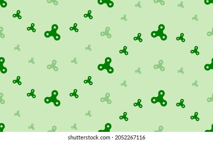 Seamless pattern of large and small green spinner symbols. The elements are arranged in a wavy. Vector illustration on light green background