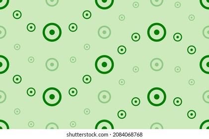 Seamless pattern of large and small green astrological sun symbols. The elements are arranged in a wavy. Vector illustration on light green background