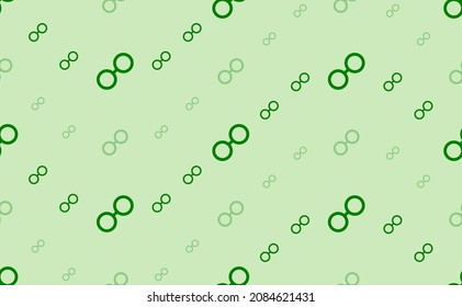 Seamless pattern of large and small green astrological opposition symbols. The elements are arranged in a wavy. Vector illustration on light green background
