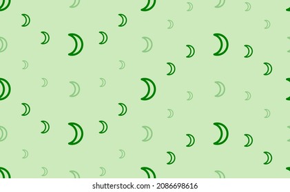 Seamless pattern of large and small green moon astrological symbols. The elements are arranged in a wavy. Vector illustration on light green background