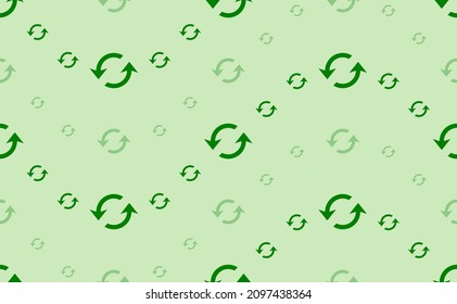 Seamless pattern of large and small green refresh symbols. The elements are arranged in a wavy. Vector illustration on light green background