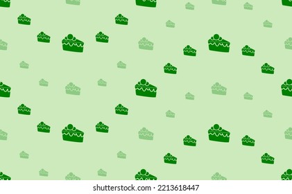Seamless pattern of large and small green piece of cake symbols. The elements are arranged in a wavy. Vector illustration on light green background