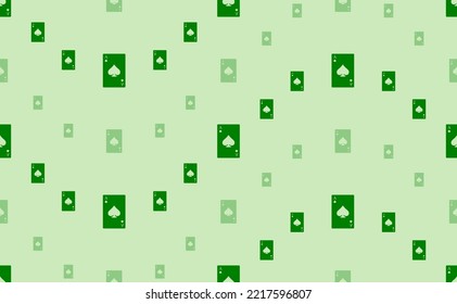 Seamless pattern of large and small green ace of spades cards. The elements are arranged in a wavy. Vector illustration on light green background