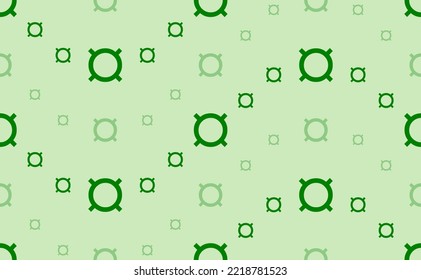Seamless pattern of large and small green currency signs. The elements are arranged in a wavy. Vector illustration on light green background