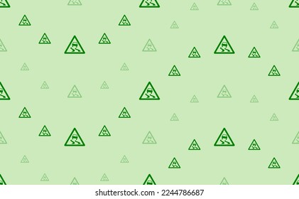 Seamless pattern of large and small green slippery road signs. The elements are arranged in a wavy. Vector illustration on light green background