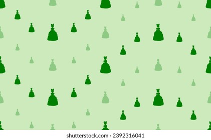 Seamless pattern of large and small green princess symbols. The elements are arranged in a wavy. Vector illustration on light green background