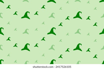 Seamless pattern of large and small green wizard hat symbols. The elements are arranged in a wavy. Vector illustration on light green background