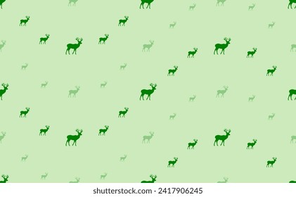 Seamless pattern of large and small green deer symbols. The elements are arranged in a wavy. Vector illustration on light green background