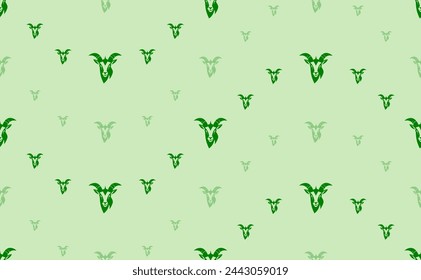 Seamless pattern of large and small green goat head symbols. The elements are arranged in a wavy. Vector illustration on light green background