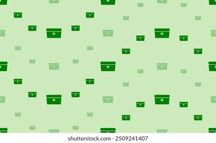 Padrão contínuo de grandes e pequenos símbolos de tórax verde. Os elementos estão dispostos em ondulado. Ilustração vetorial no plano de fundo verde claro
