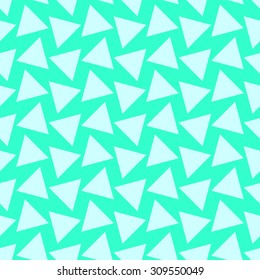 Seamless pattern with large triangles in different directions on a bright azure gentle green turquoise background