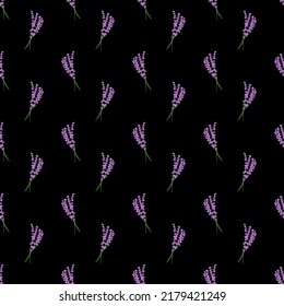 Seamless pattern lavender flowers pattern on black background.Floral vector pattern.