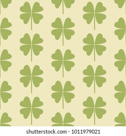 Seamless pattern with a leaf of clover. Flat vector Illustration