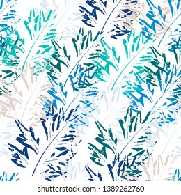 Seamless pattern of leaf prints. Stylish wallpaper of colorful leaves.Colorful leaves prints on a white background.