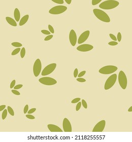 Seamless pattern with leaves. Abstract geometric pastel pattern with green leafs. Random, chaotic beige background with green plants.