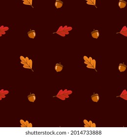 Seamless pattern with leaves and acorn on red background. Abstract autumn texture. Design for fabric, wallpaper, textile and decor.