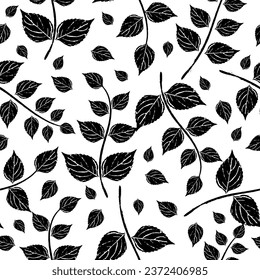 Seamless pattern with leaves and branches in black and white.