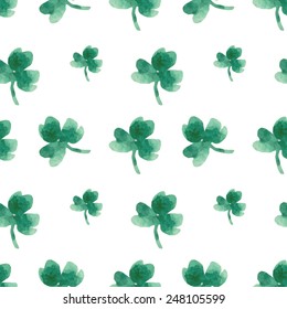 Seamless pattern of leaves of clover in a watercolor style. Vector illustration
