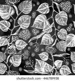 Seamless pattern with leaves and flowers. Linden tree botanical illustration. Vector floral white sketch on dark background.