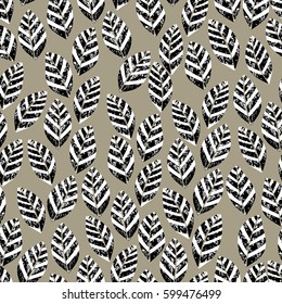 Seamless pattern with leaves with grunge effect, fading, and scratches. Seamless vector illustration for printing on fabric, textile, wrapping, scrapbooking.A floral background. Retro vintage style. 