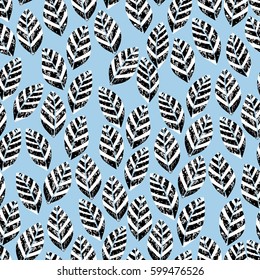 Seamless pattern with leaves with grunge effect, fading, and scratches. Seamless vector illustration for printing on fabric, textile, wrapping, scrapbooking. A floral background. Retro vintage style. 