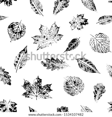 Seamless pattern with leaves imprints. Black and white.