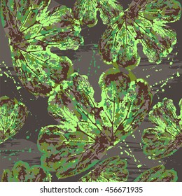Seamless pattern of leaves in military style. Abstract ornament backdrop for fabric, textile.