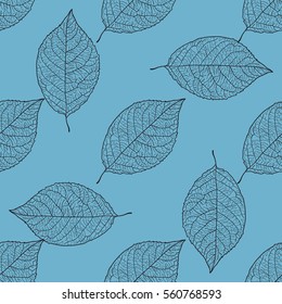 the seamless pattern - leaves on the blue background