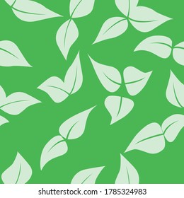 
seamless pattern of leaves on a green background