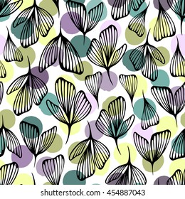 Seamless pattern with leaves and petals on a polka dot background.